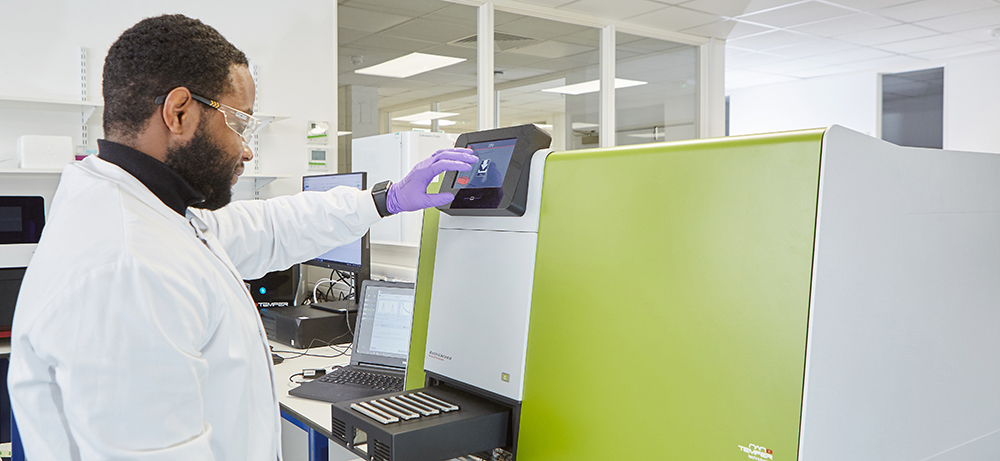 Scientist working with machinary